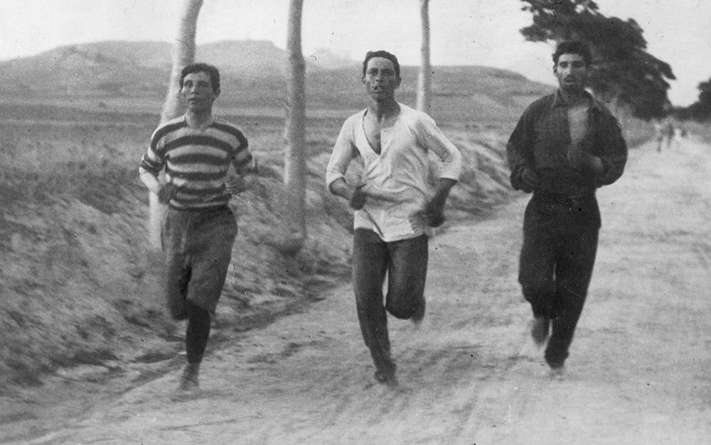 1896: Three athletes in training for the marathon at the Olympic Games in Athens. (Photo by Burton Holmes/Henry Guttmann/Getty Images)