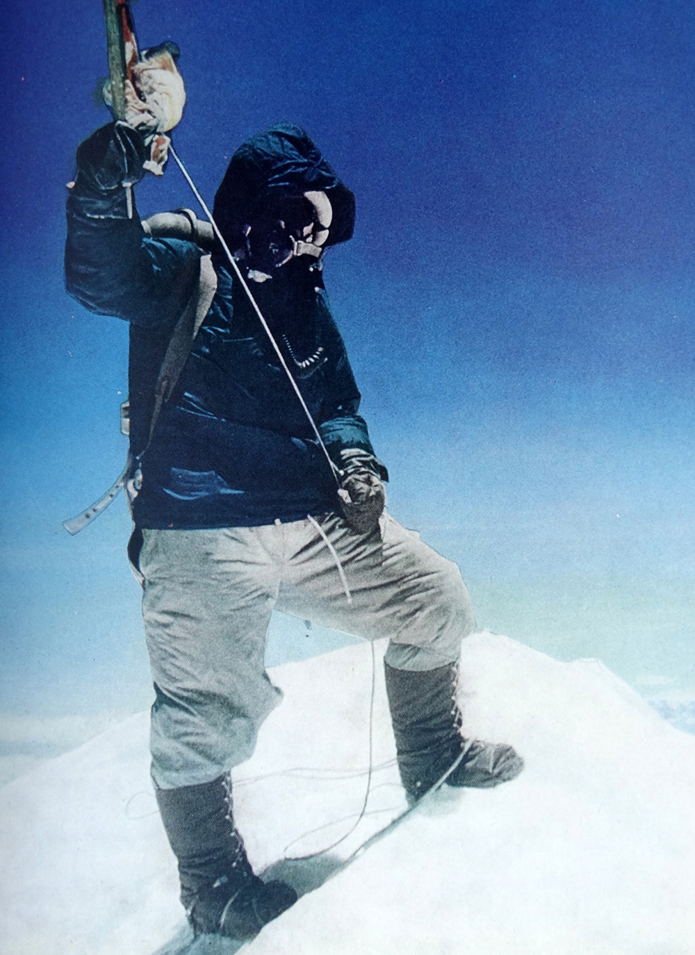Tenzing Norgay (29 May 1914 ¬Ц 9 May 1986), referred to as Sherpa Tenzing, was a Nepalese Sherpa mountaineer. Sir Edmund Percival Hillary KG ONZ KBE (20 July 1919 ¬Ц 11 January 2008) was a New Zealand mountaineer, explorer and philanthropist. On 29 May 1953, Hillary and Nepalese Sherpa mountaineer Tenzing Norgay became the first climbers to reach the summit of Mount Everest. Hillary took the famous photo of Tenzing posing with his ice-axe, according to Tenzing's autobiography Man of Everest, when Tenzing offered to take Hillary's photograph Hillary declined: (Photo by: Universal History Archive/UIG via Getty Images)