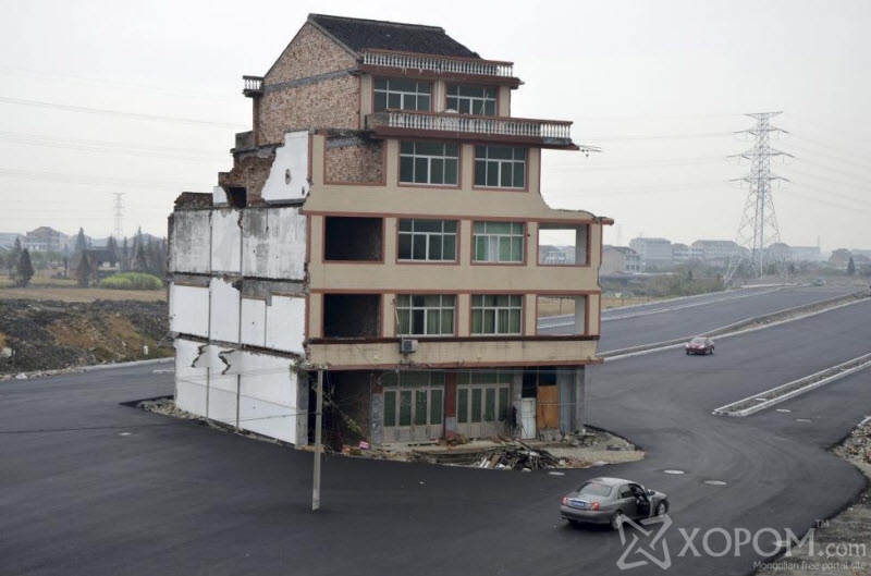 Бүтээн байгуулалтын замд хөндөлсөх Хятадын байшингууд 5