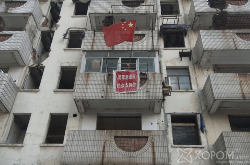 Бүтээн байгуулалтын замд хөндөлсөх Хятадын байшингууд 18